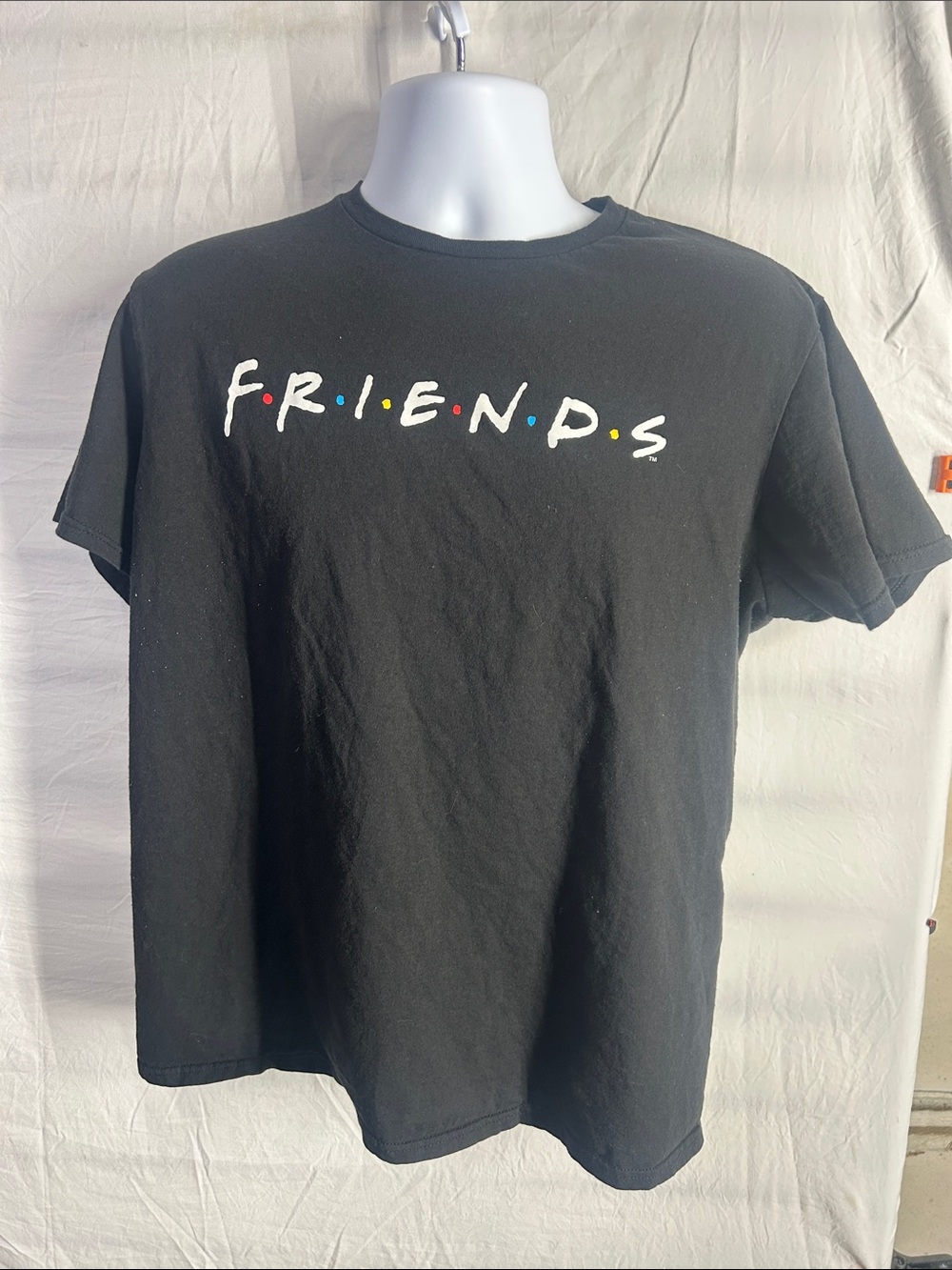 FRIENDS Black Logo Short Sleeve Tee with Red Yellow Blue Accent Dots
